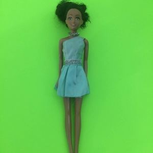 Girls brownskin barbie doll with teal dress